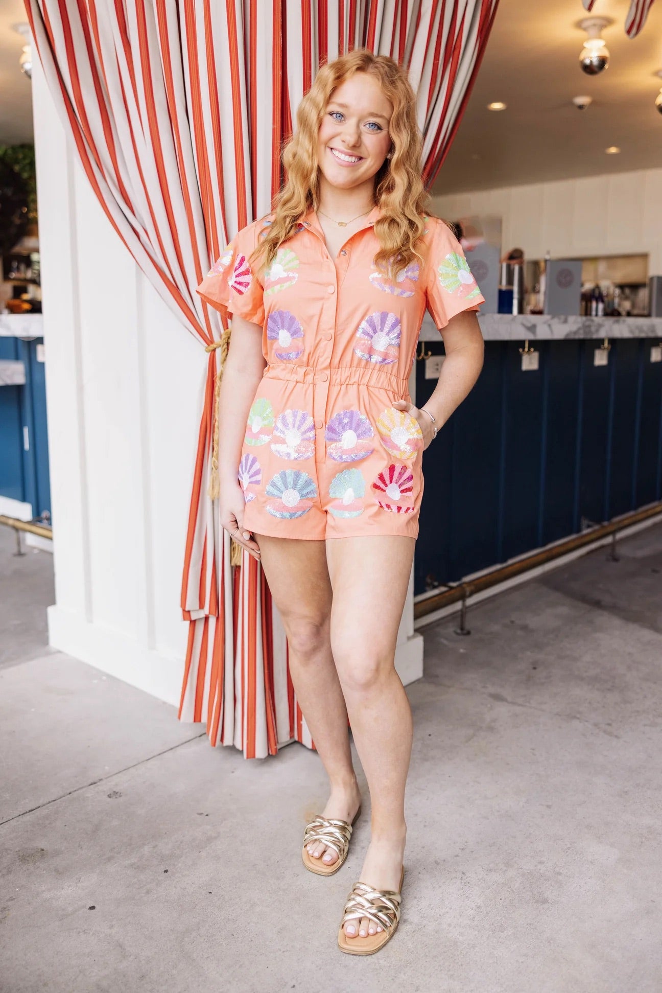 Queen of Sparkles Orange Clam Romper